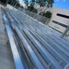 8 row bleachers from Southeastern Seating set up for a sporting event on a sunny day.