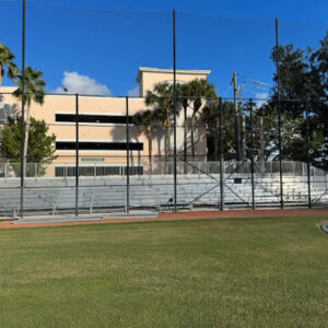 Southeastern Seating 8 row aluminum bleachers set up for a baseball game.